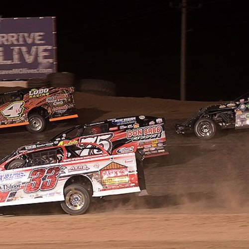 Zack VanderBeek (33z), Terry Phillips (75), Tyler Wolff (4w) and Stormy Scott (2s) race for position in the main event during the 9th Annual USMTS Missouri Meltdown at the I-35 Speedway in Winston, Mo., on Saturday, April 22, 2017.